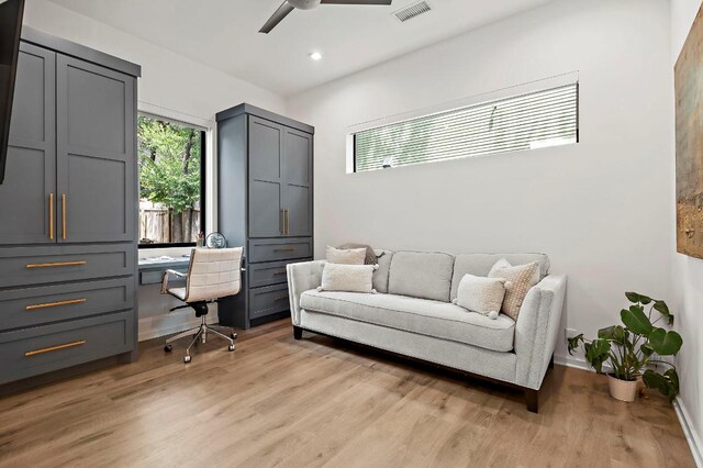 2312 Pruett St, Austin, TX 78703 - office with light wood-style flooring, ceiling fan, built in desk, baseboards, and recessed lighting