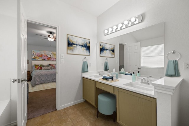 2803 Glenwood Trl, Cedar Park, TX 78613 - ensuite bathroom with double vanity, ceiling fan, tile patterned floors, and baseboards