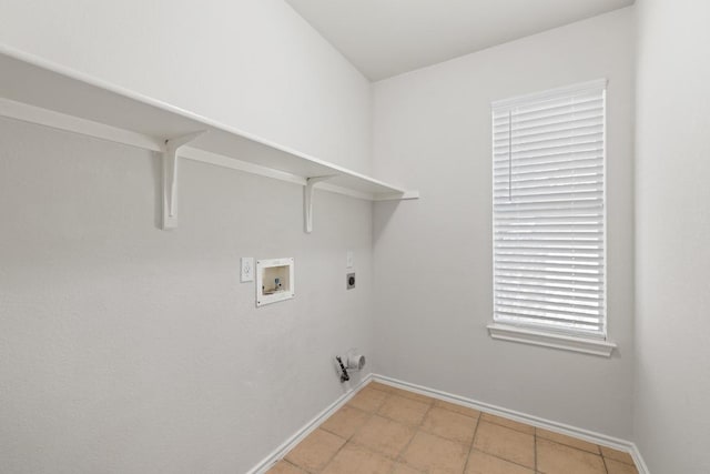 2803 Glenwood Trl, Cedar Park, TX 78613 - laundry room featuring hookup for a washing machine, hookup for an electric dryer, baseboards, and light tile patterned floors