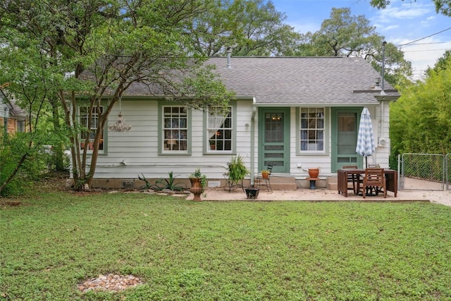 3003 Dancy St, Austin, TX 78722 - view of front of home featuring roof with shingles, a gate, a patio, and crawl space