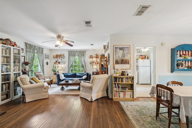 3003 Dancy St, Austin, TX 78722 - living room with a ceiling fan and wood finished floors