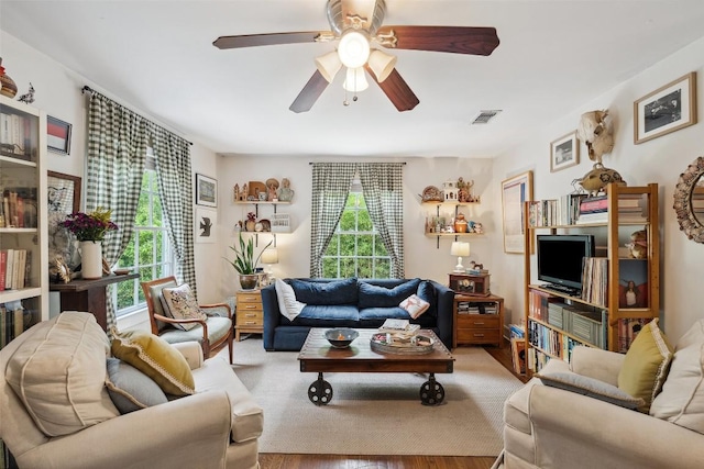 3003 Dancy St, Austin, TX 78722 - living room featuring a ceiling fan and wood finished floors