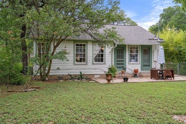 3003 Dancy St, Austin, TX 78722 - view of front of house with crawl space, a shingled roof, and a patio