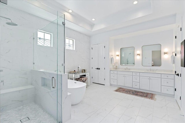 213 Black Wolf Run, Austin, TX 78738 - bathroom featuring a marble finish shower, double vanity, a soaking tub, marble finish floors, and recessed lighting