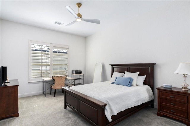 213 Black Wolf Run, Austin, TX 78738 - bedroom with light carpet, baseboards, and a ceiling fan