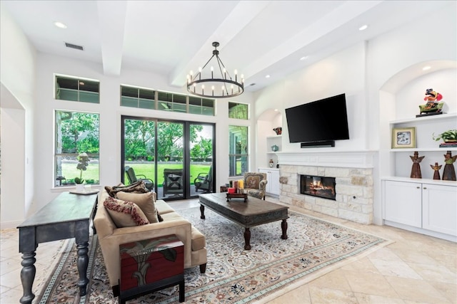 213 Black Wolf Run, Austin, TX 78738 - living room with built in features, recessed lighting, a chandelier, a fireplace, and beam ceiling