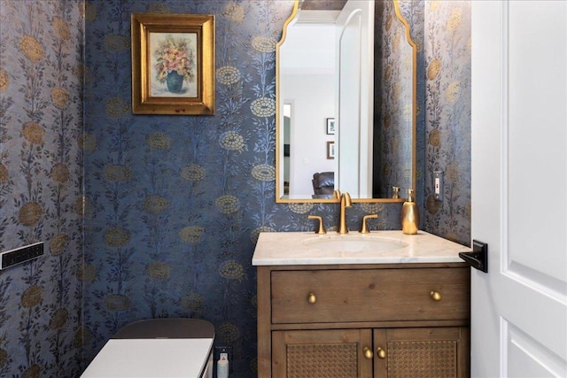 213 Black Wolf Run, Austin, TX 78738 - half bathroom with vanity and wallpapered walls
