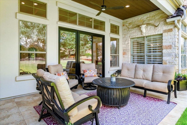 213 Black Wolf Run, Austin, TX 78738 - view of patio / terrace with an outdoor living space and a ceiling fan
