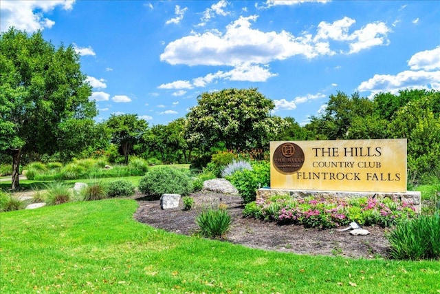 213 Black Wolf Run, Austin, TX 78738 - community sign featuring a yard