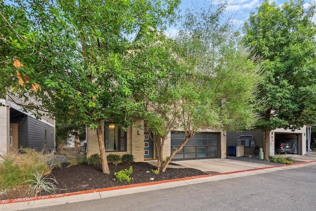 2807 Del Curto Rd Unit G, Austin, TX 78704 - obstructed view of property with driveway and a garage