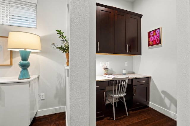 2807 Del Curto Rd Unit G, Austin, TX 78704 - office space featuring built in desk, dark wood-type flooring, and baseboards
