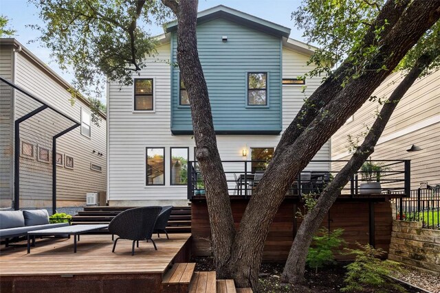 2807 Del Curto Rd Unit G, Austin, TX 78704 - back of property with a deck, an outdoor living space, and stairs