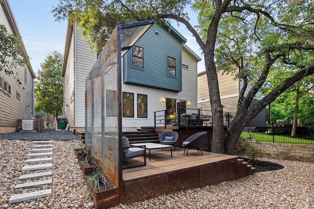 2807 Del Curto Rd Unit G, Austin, TX 78704 - back of house featuring a deck and central AC
