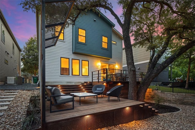 2807 Del Curto Rd Unit G, Austin, TX 78704 - back of property at dusk with a deck and central AC unit