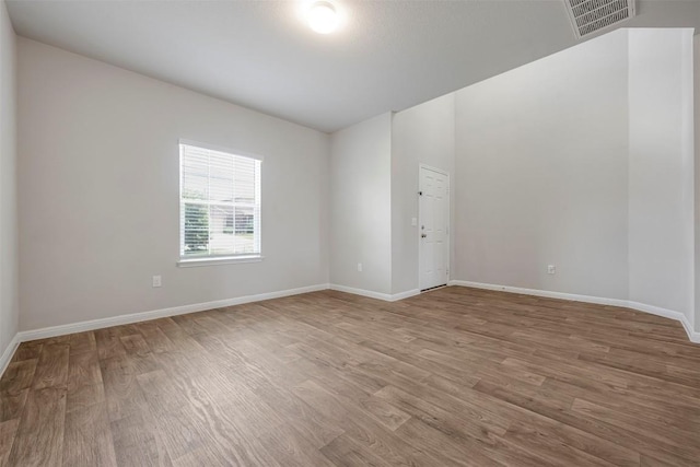 10820 Gonzales Ranger Pass, Austin, TX 78754 - empty room featuring wood finished floors and baseboards