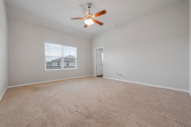 10820 Gonzales Ranger Pass, Austin, TX 78754 - carpeted spare room with lofted ceiling, a ceiling fan, and baseboards