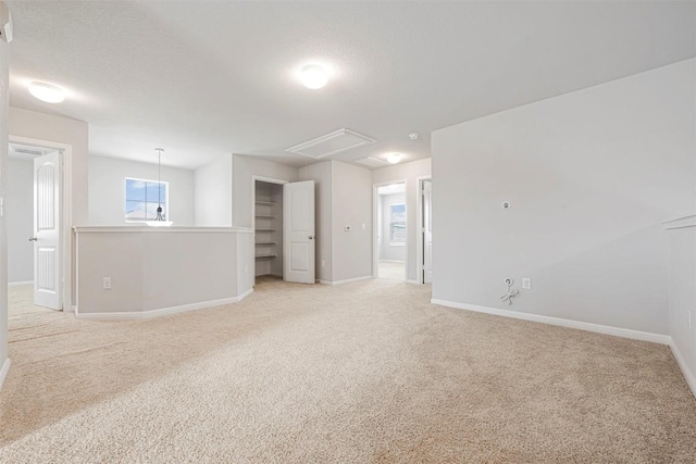 10820 Gonzales Ranger Pass, Austin, TX 78754 - unfurnished room with attic access, light colored carpet, and baseboards