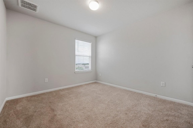 10820 Gonzales Ranger Pass, Austin, TX 78754 - unfurnished room featuring carpet flooring and baseboards