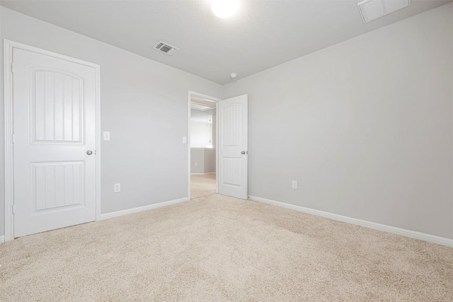 10820 Gonzales Ranger Pass, Austin, TX 78754 - unfurnished bedroom with light colored carpet and baseboards