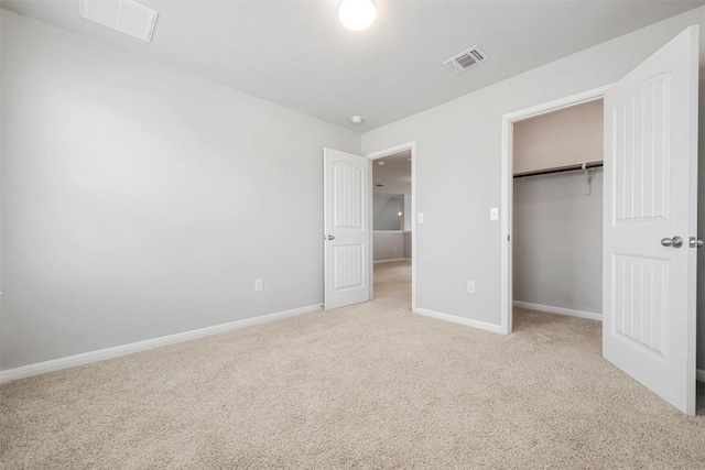10820 Gonzales Ranger Pass, Austin, TX 78754 - unfurnished bedroom featuring carpet floors, baseboards, and a closet