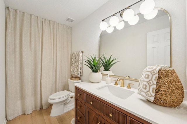 111 Hiver Cir, Kyle, TX 78640 - full bathroom featuring vanity and wood finished floors