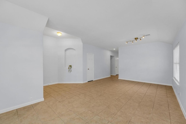 1908 Paradise Ridge Dr, Round Rock, TX 78665 - empty room with vaulted ceiling and baseboards