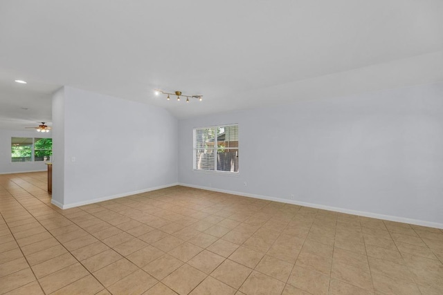 1908 Paradise Ridge Dr, Round Rock, TX 78665 - spare room featuring baseboards, a ceiling fan, light tile patterned floors, and recessed lighting