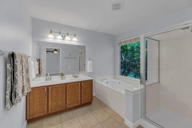 1908 Paradise Ridge Dr, Round Rock, TX 78665 - bathroom with double vanity, a bath, tile patterned flooring, a stall shower, and ceiling fan