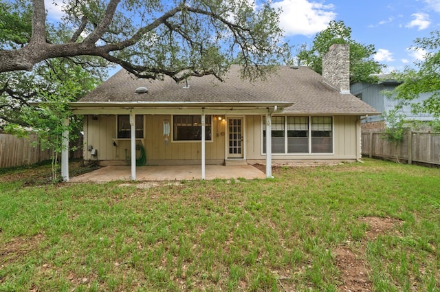 11708 Barrington Way, Austin, TX 78759 - rear view of property featuring a chimney, a patio, and a shingled roof