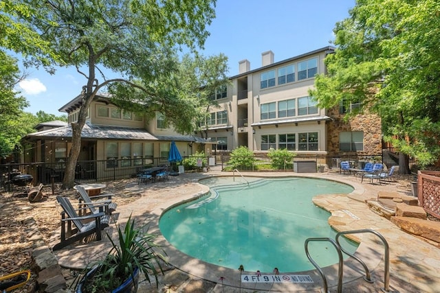 2216 Thornton Rd Unit 221, Austin, TX 78704 - community pool featuring a patio area