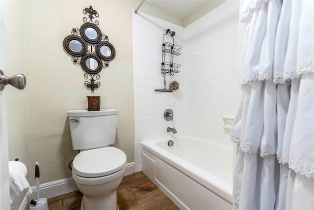 1135 Barton Hills Dr Unit 160, Austin, TX 78704 - bathroom featuring wood finished floors, toilet, shower / bath combo, and baseboards