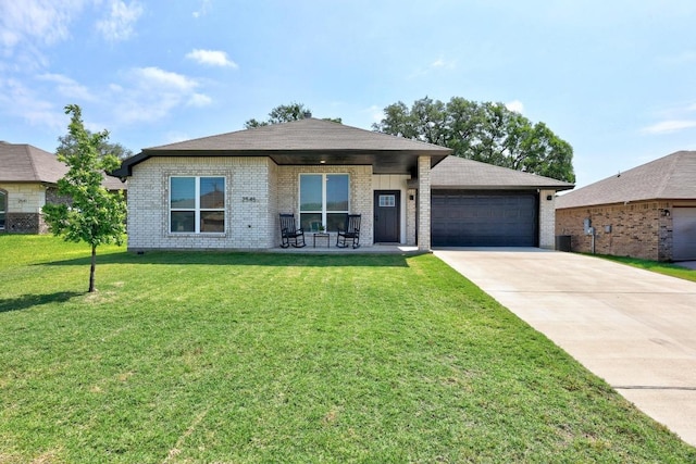 2545 Belle Hubbard Trl, Belton, TX 76513 - ranch-style home with brick siding, a front yard, and a garage