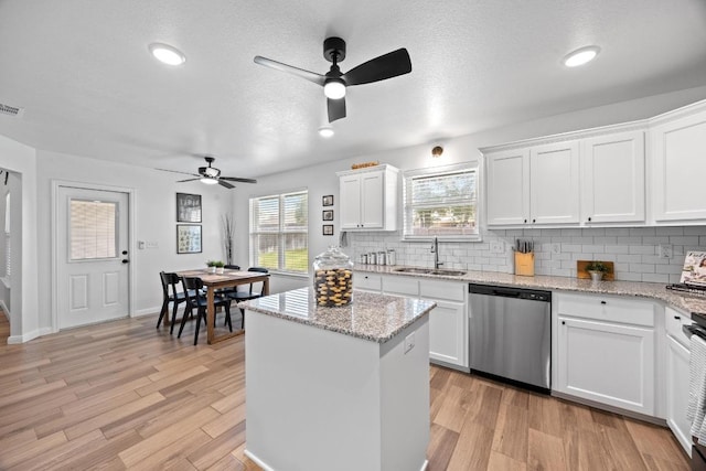 2545 Belle Hubbard Trl, Belton, TX 76513 - kitchen featuring dishwasher, a sink, ceiling fan, decorative backsplash, and recessed lighting