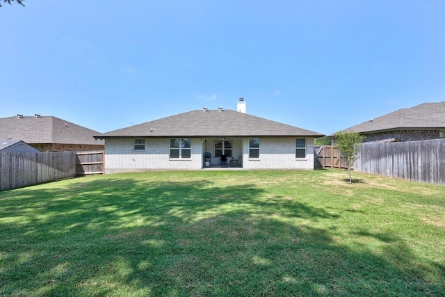 2545 Belle Hubbard Trl, Belton, TX 76513 - rear view of property featuring brick siding, a patio, and a chimney