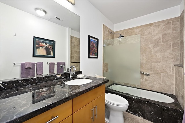 360 Nueces St Unit 3602, Austin, TX 78701 - full bath featuring toilet, vanity, enclosed tub / shower combo, and tile patterned floors