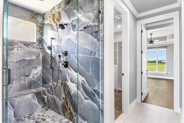 178 Balch Rd, Elgin, TX 78621 - bathroom featuring crown molding, a marble finish shower, ceiling fan, and tile patterned floors