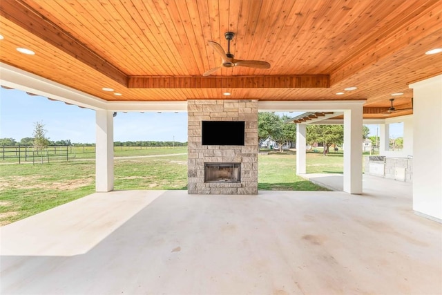 178 Balch Rd, Elgin, TX 78621 - view of patio / terrace with an outdoor stone fireplace and ceiling fan