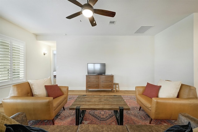 192 Call Dr, Austin, TX 78737 - living room featuring ceiling fan, wood finished floors, and baseboards
