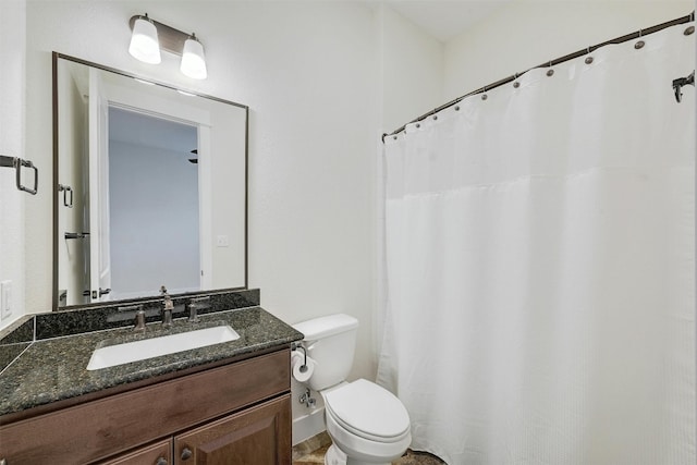 192 Call Dr, Austin, TX 78737 - full bathroom featuring toilet, vanity, and a shower with shower curtain