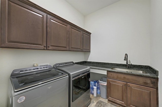 192 Call Dr, Austin, TX 78737 - laundry room with cabinet space and washing machine and clothes dryer