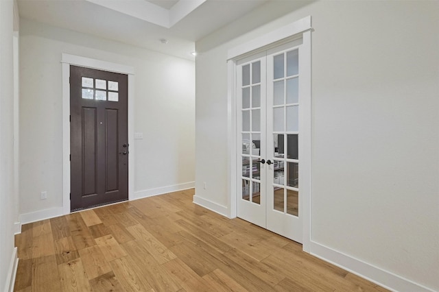 192 Call Dr, Austin, TX 78737 - entryway with french doors, light wood-style flooring, and baseboards