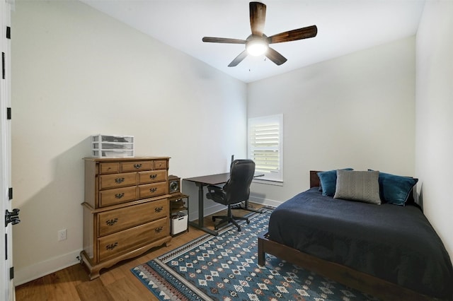 192 Call Dr, Austin, TX 78737 - bedroom featuring a desk, baseboards, light wood-style flooring, and ceiling fan