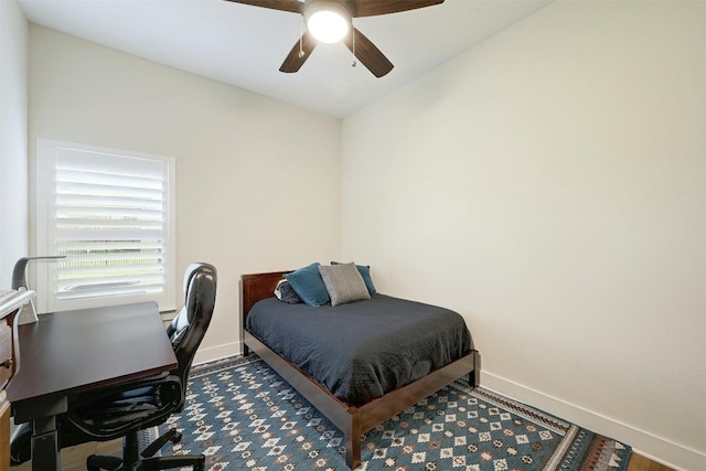 192 Call Dr, Austin, TX 78737 - bedroom featuring baseboards, a desk, and a ceiling fan