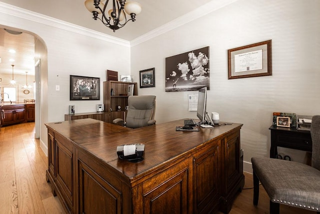 110 Saint Richie Ln, Austin, TX 78737 - office with arched walkways, a chandelier, light wood-style floors, ornamental molding, and a sink