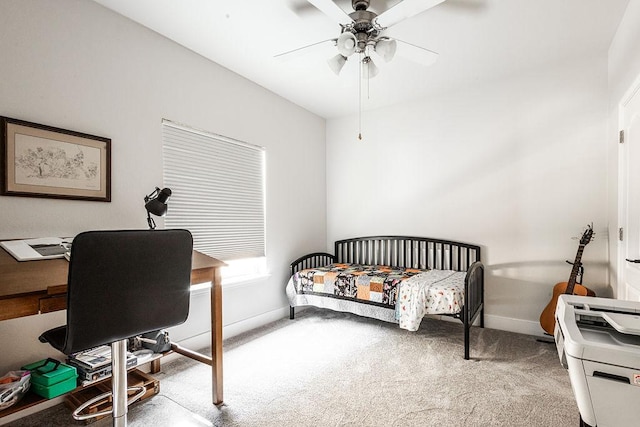 110 Saint Richie Ln, Austin, TX 78737 - carpeted bedroom with baseboards, an office area, and a ceiling fan