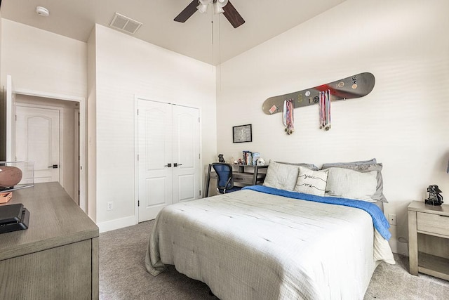 110 Saint Richie Ln, Austin, TX 78737 - bedroom with carpet, a closet, baseboards, ceiling fan, and lofted ceiling