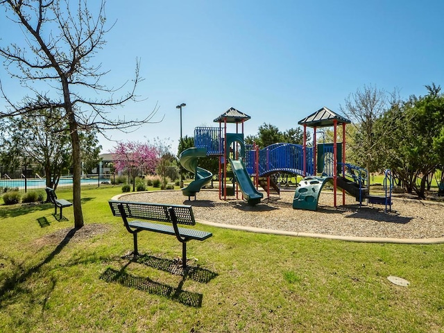 14 Verde Ranch Loop, Leander, TX 78641 - community play area featuring a lawn