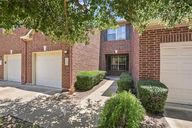 14 Verde Ranch Loop, Leander, TX 78641 - view of front of house featuring brick siding and a garage