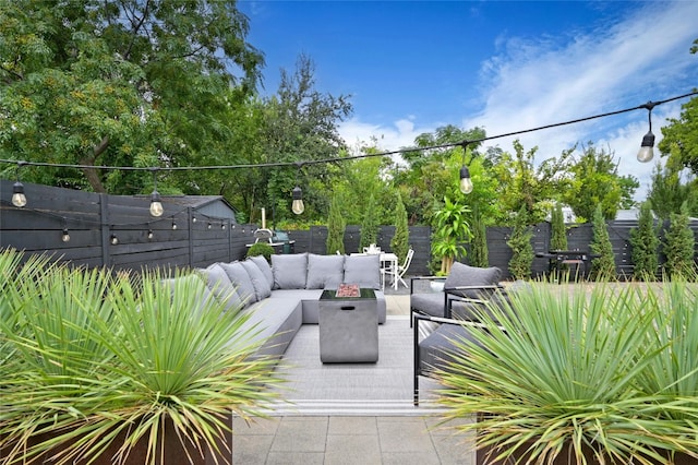 1712 Hartford Rd, Austin, TX 78703 - fenced backyard featuring an outdoor living space with a fire pit and a patio