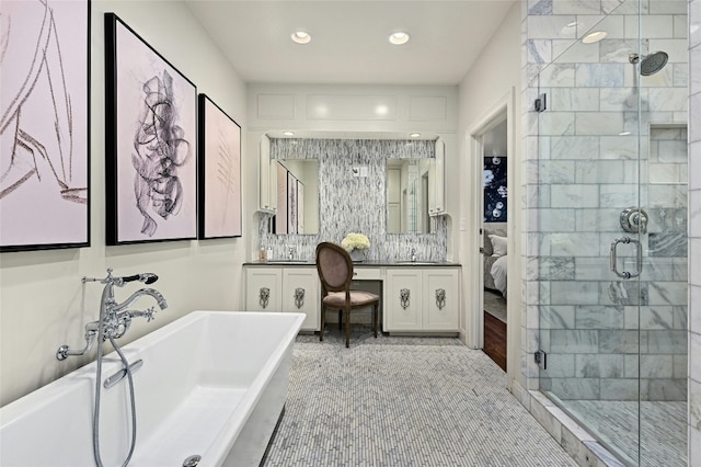 1712 Hartford Rd, Austin, TX 78703 - bathroom featuring ensuite bath, a shower stall, vanity, a freestanding bath, and recessed lighting
